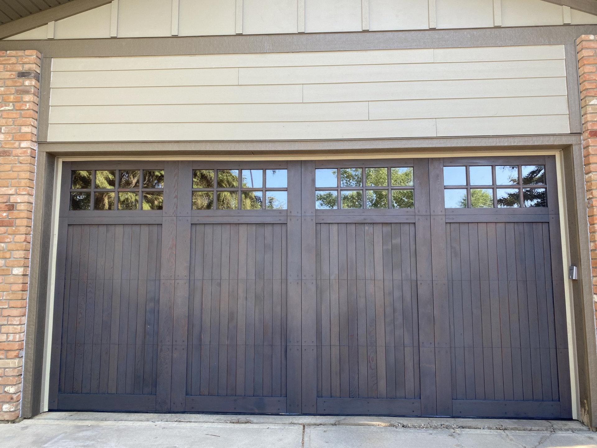 Completed exterior finishing detail on a Calgary garage project