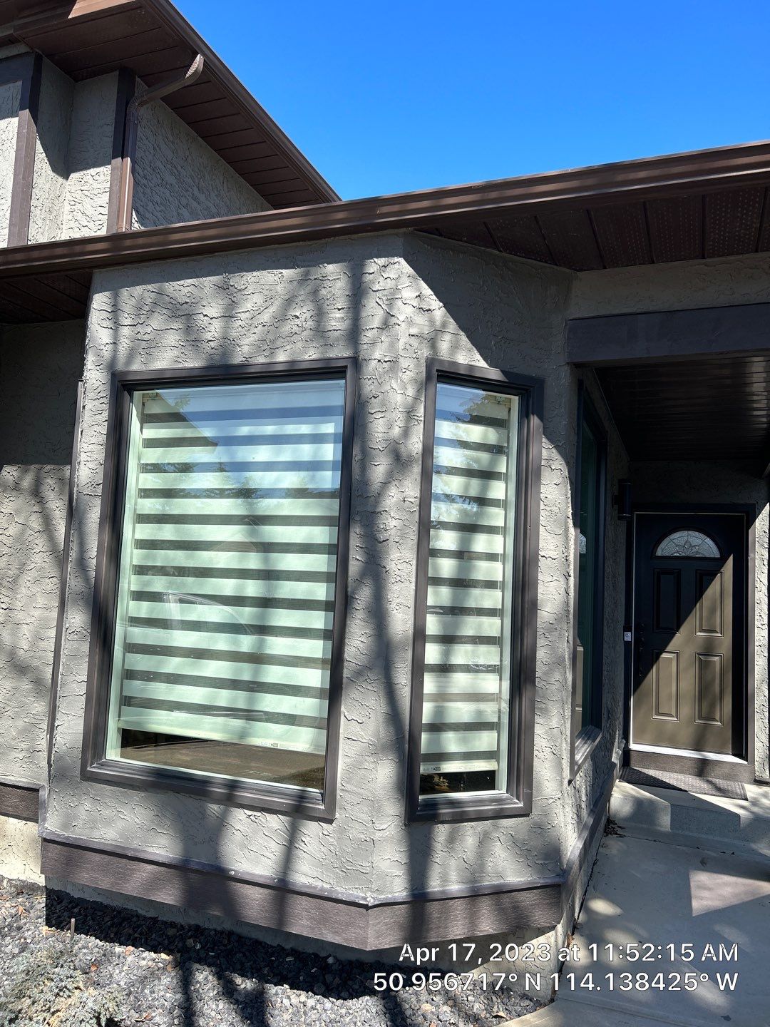 Exterior trim and coating detail on a Calgary home