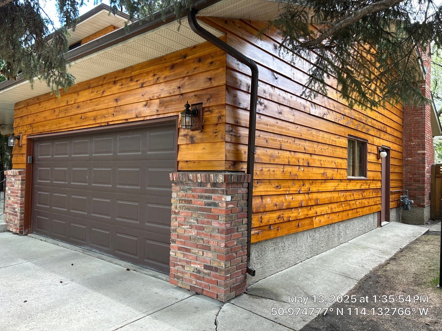 Finished exterior upgrade on a Calgary garage and wall project