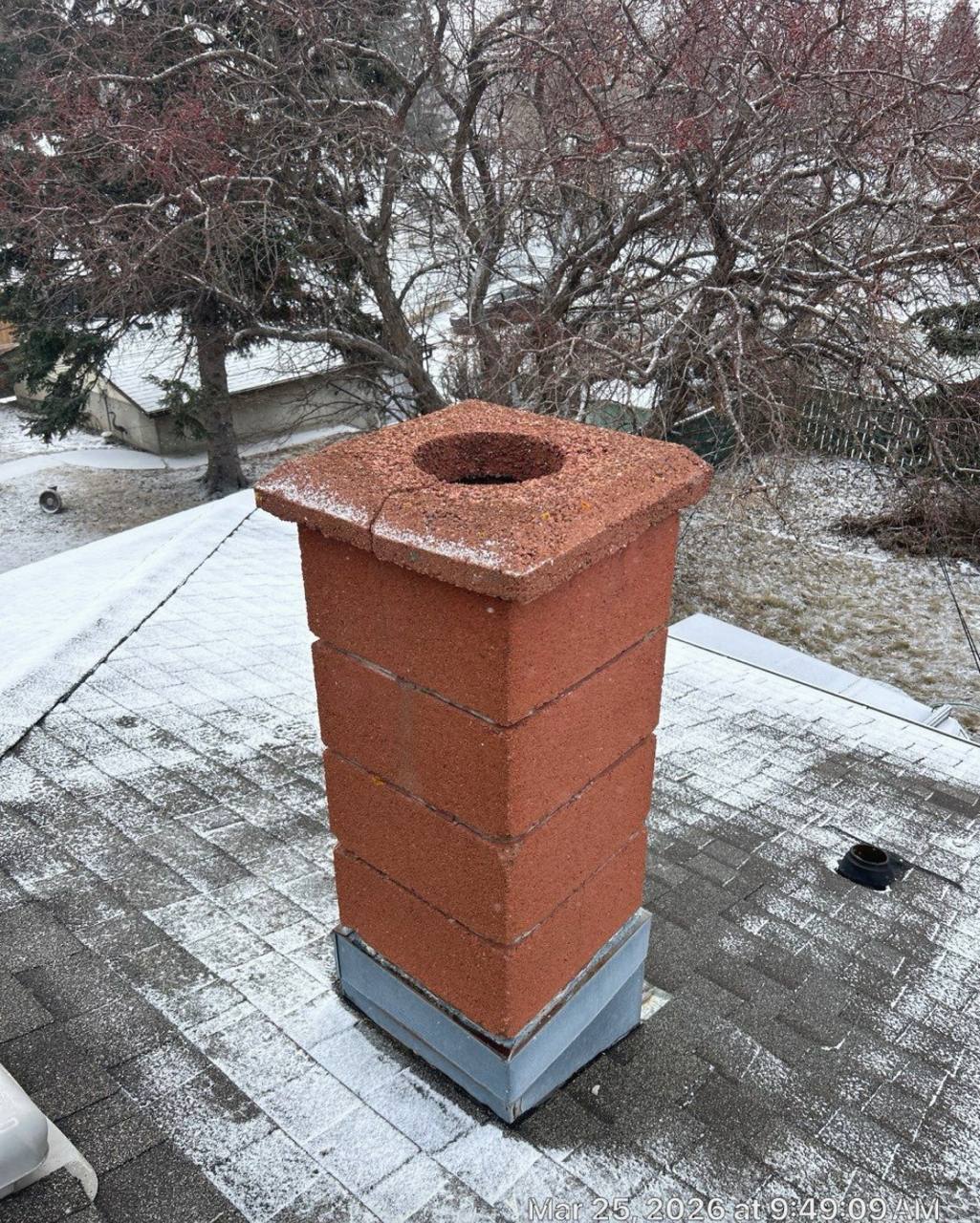 Before photo of a Calgary chimney before stucco plaster and new crown work