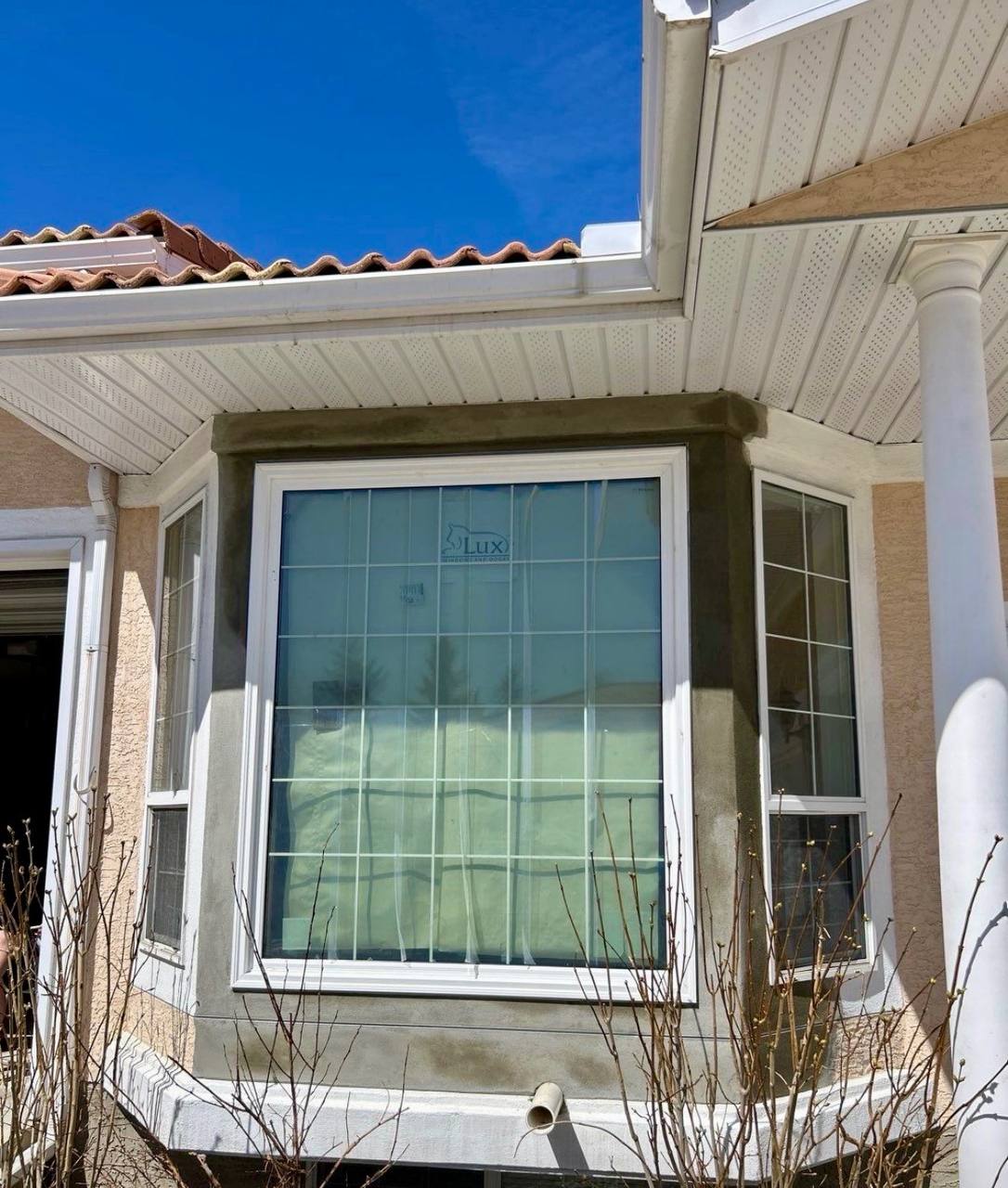 Completed stucco window replacement Calgary High End Construction